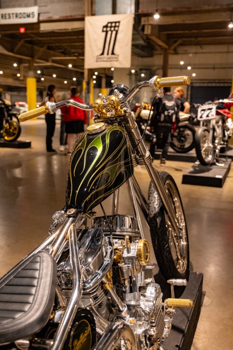 A close-up of a chopper's engine and frame, highlighting the raw power and mechanical beauty of a custom build.